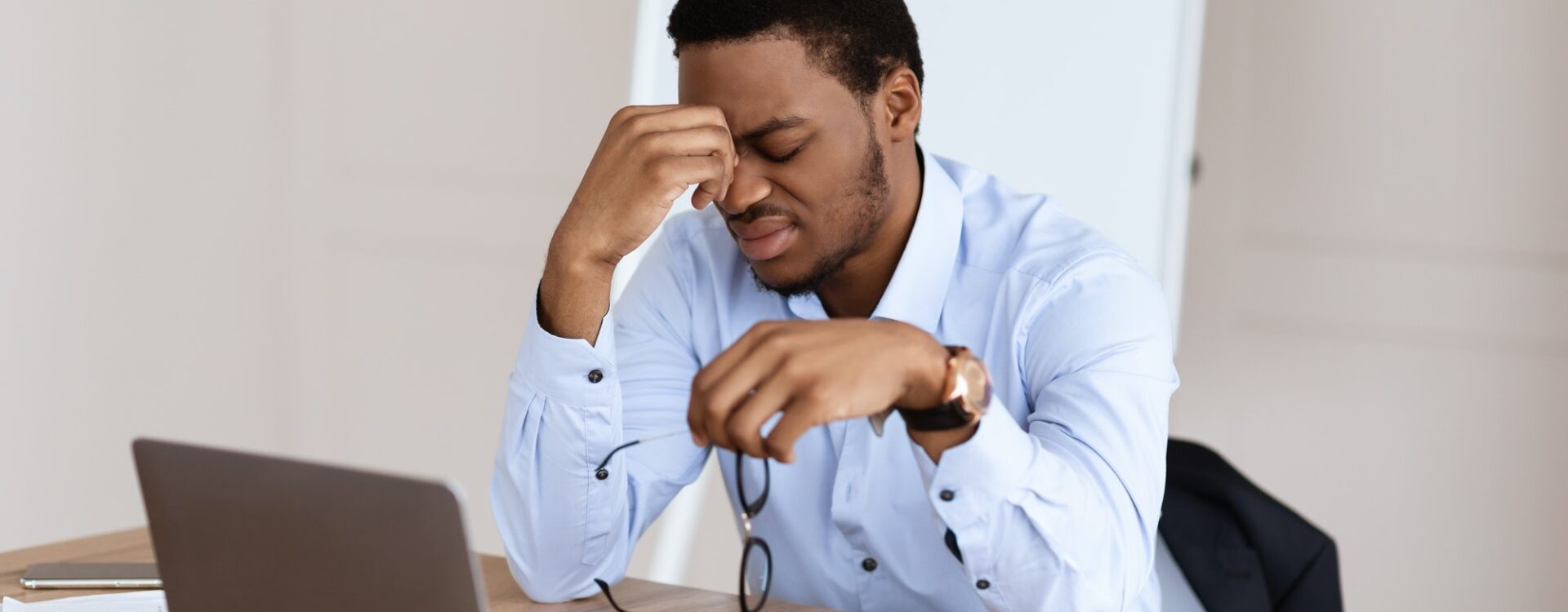Exhausted african american manager suffering from burnout