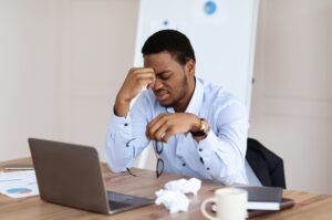 Exhausted african american manager suffering from burnout
